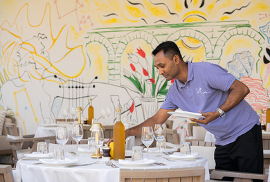 person setting table